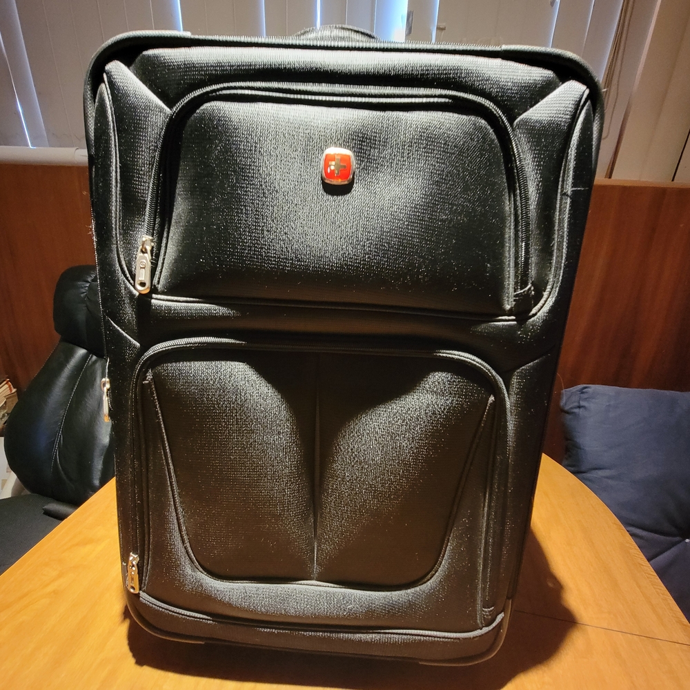 Elegant Black Travel Bag with Red Detail